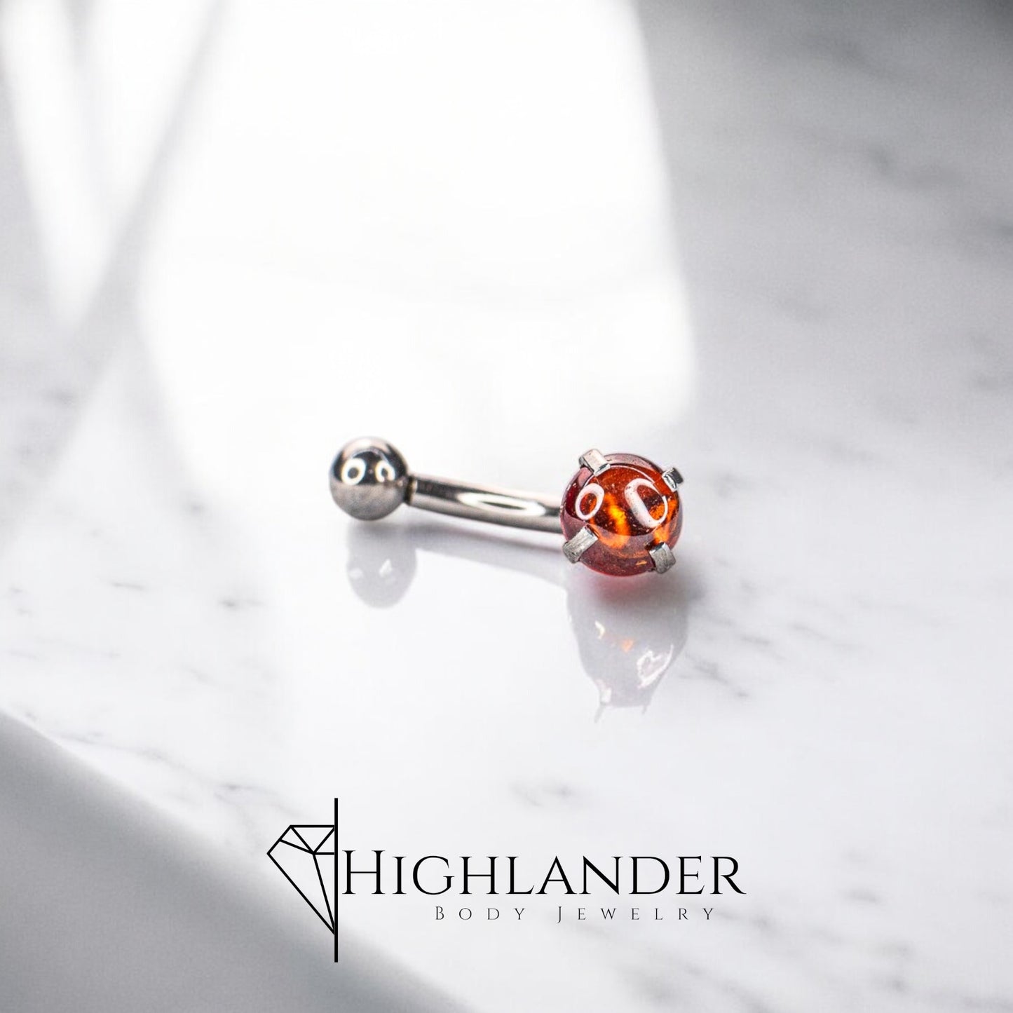 Red CZ Cabochon Eyebrow Curved Barbell