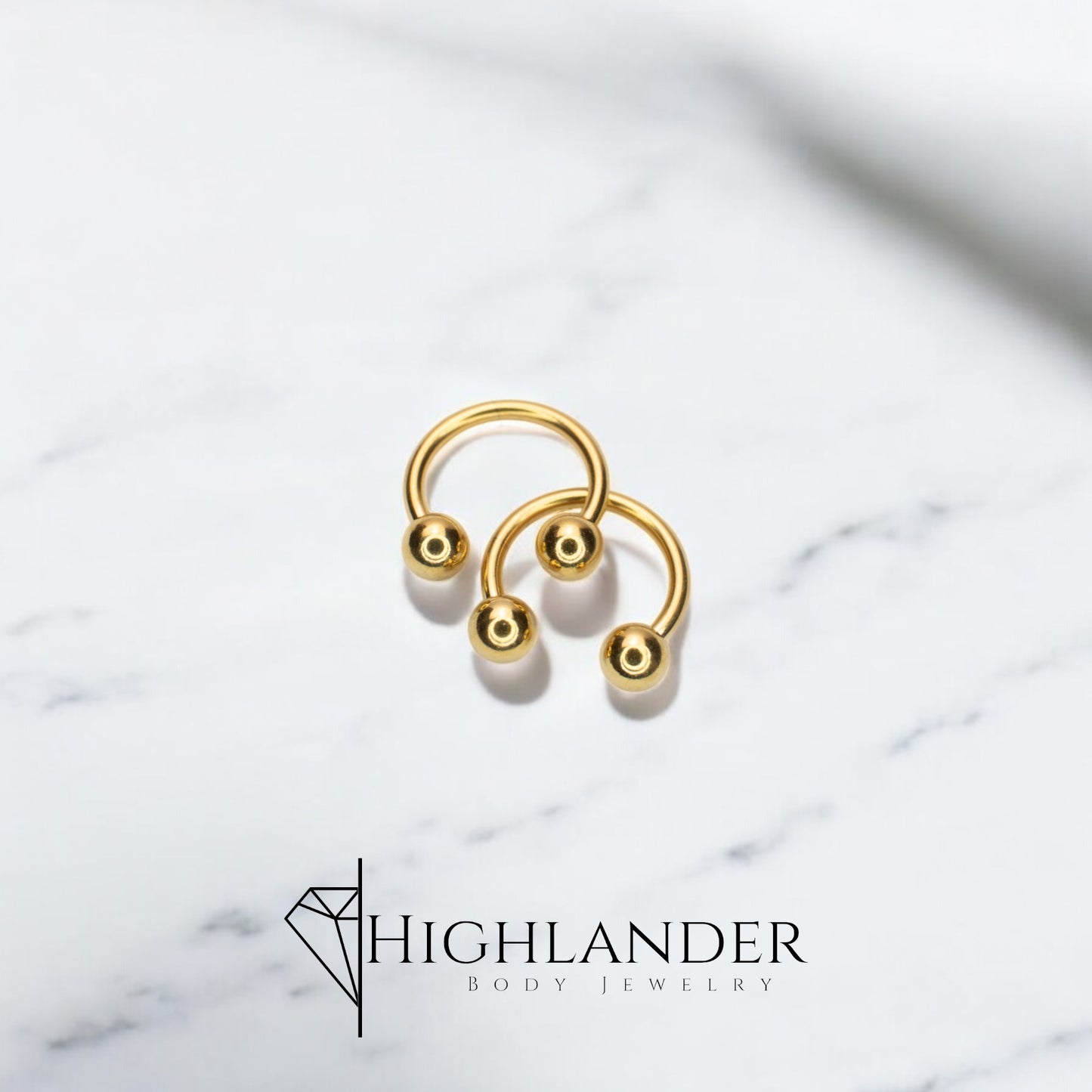 Gold IP over Titanium Horseshoe with Ball Ends Nipple Rings