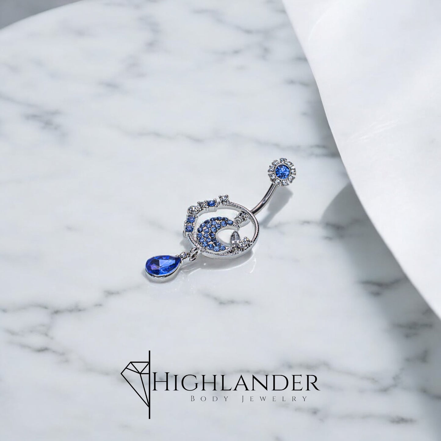 Blue and White CZ Paved Moon with Teardrop Nave Piercing - Dangle