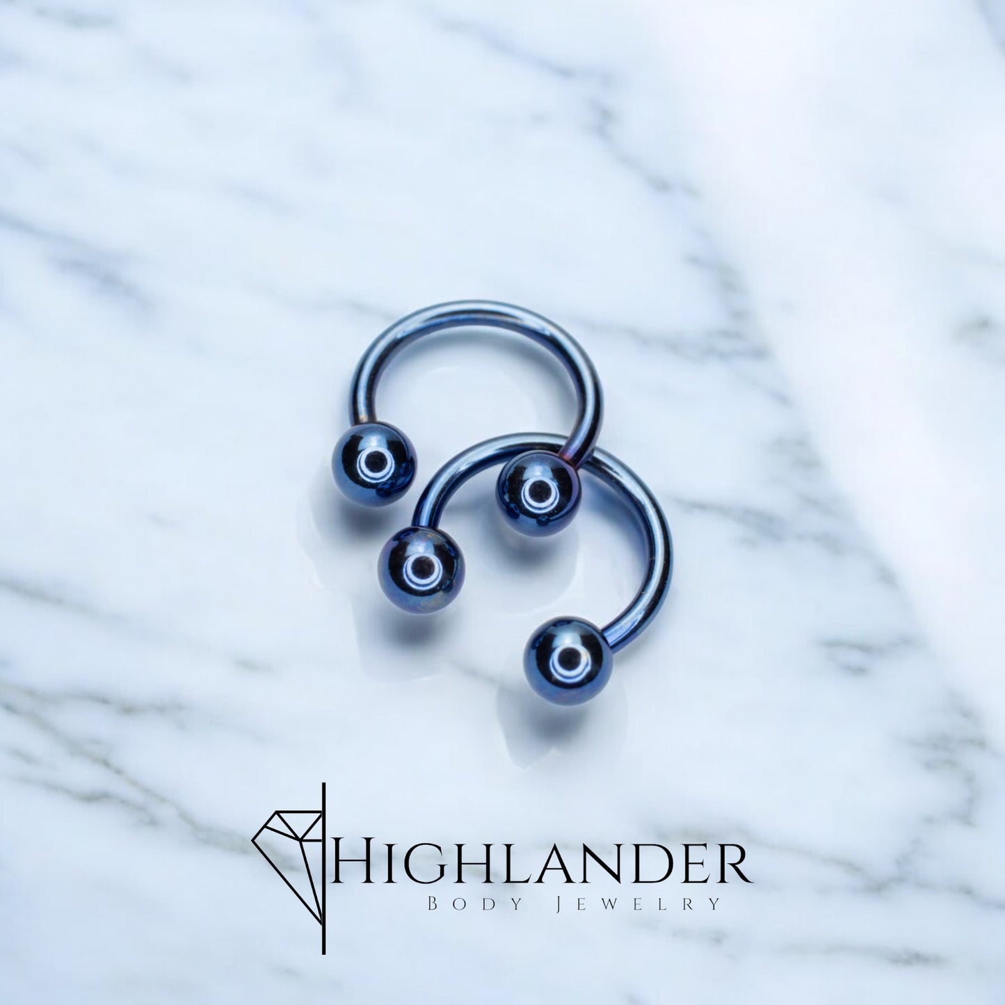 Titanium IP Dark Blue Ball Horseshoe Nipple Piercing